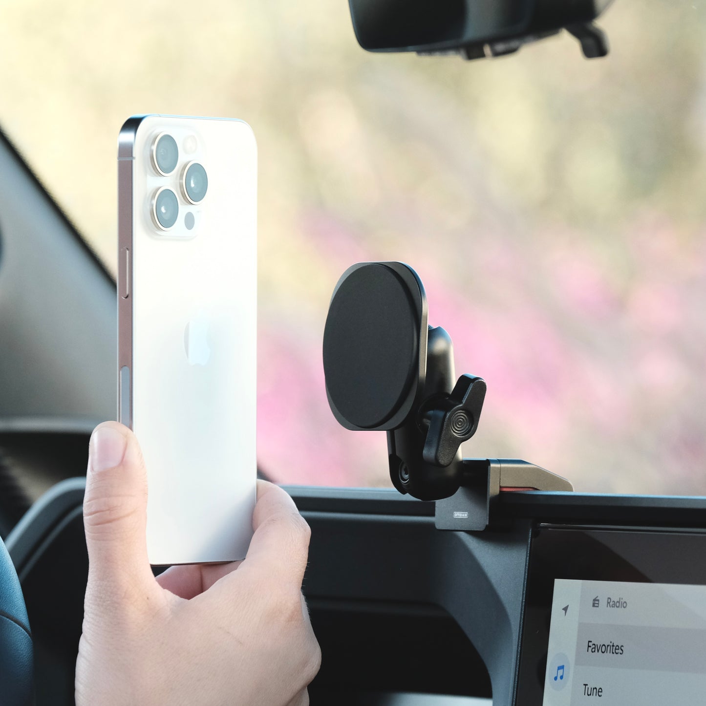 Image of Offroam MagSafe-compatible Phone Mount installed securely in Toyota Land Cruiser Prado 250 2024-2025. This premium phone mount installs easily without drilling or glue. High force magnets hold phone on any trail, road, or track. Perfect placement without blocking screens, driver view, or air flow. Fully adjustable positioning.