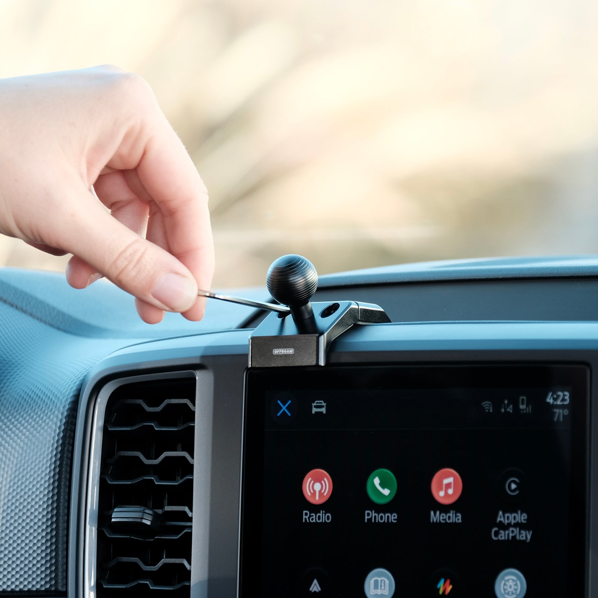 Image of Offroam Mounting Base installed securely in Ford Ranger | Everest 2022-2025. This premium all metal phone mounting base installs easily without drilling or glue. Perfect placement without blocking screens, driver view, or air flow.