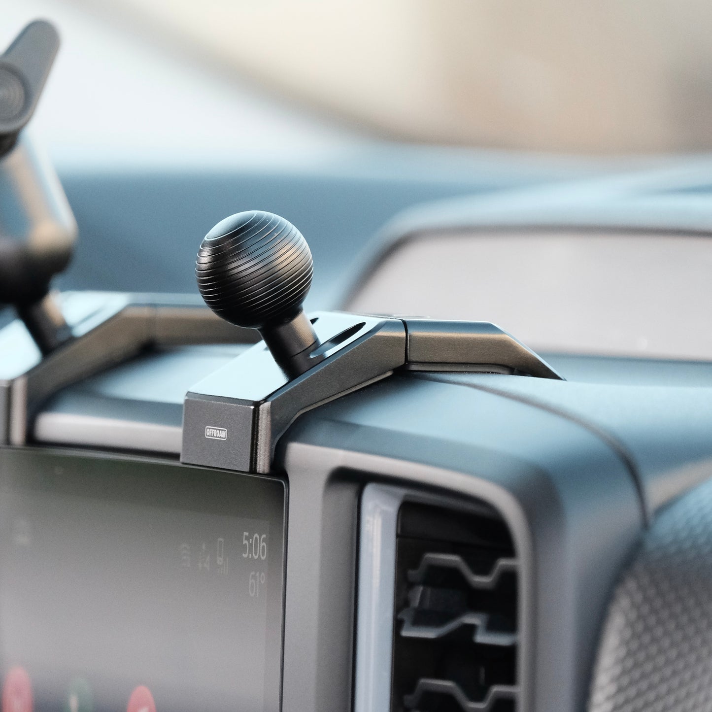 Image of Offroam Mounting Base installed securely in Ford Ranger | Everest 2022-2025. This premium all metal phone mounting base installs easily without drilling or glue. Perfect placement without blocking screens, driver view, or air flow.