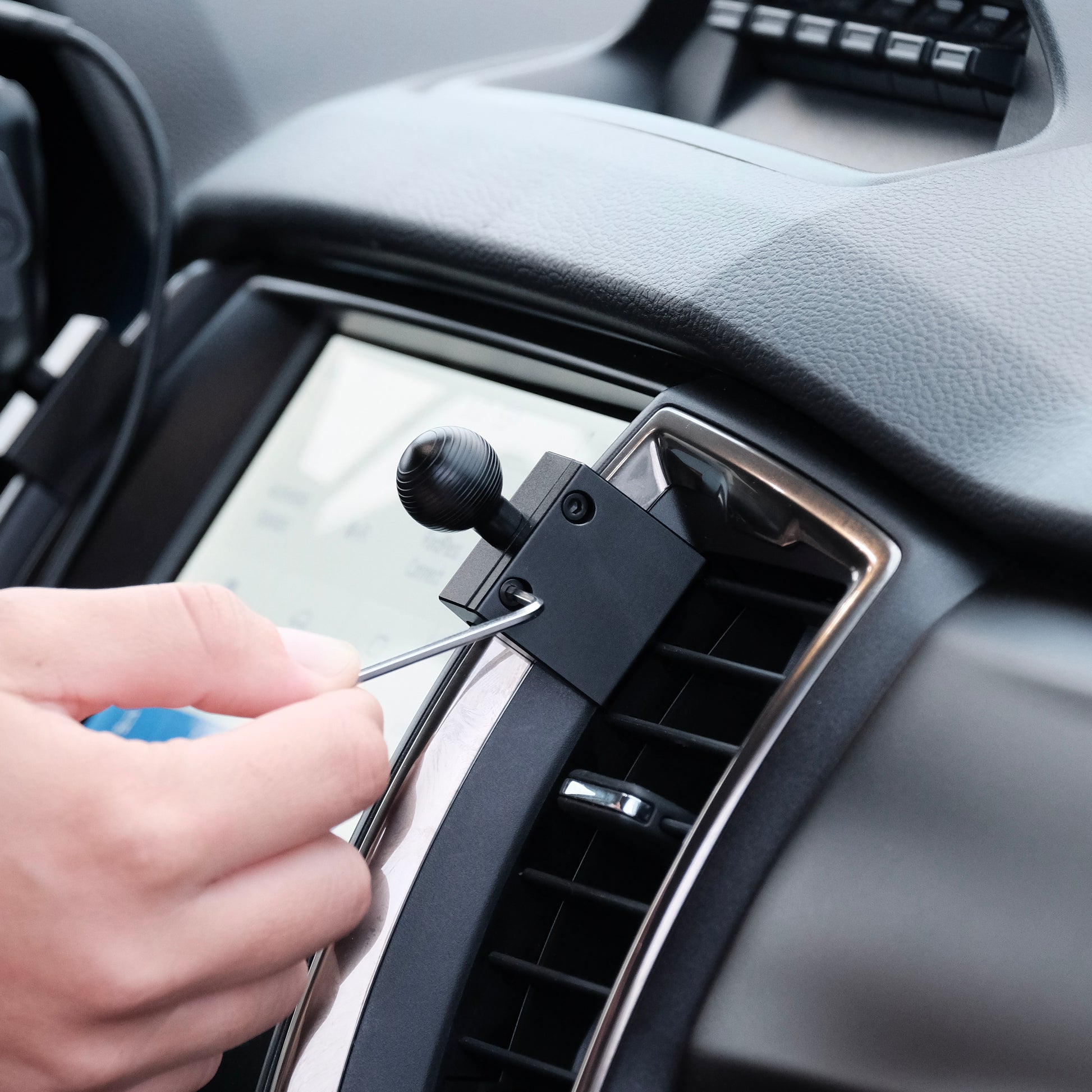 Image of Offroam Mounting Base installed securely in Ford Ranger | Everest 2015-2021. This premium all metal phone mounting base installs easily without drilling or glue. Perfect placement without blocking screens, driver view, or air flow.