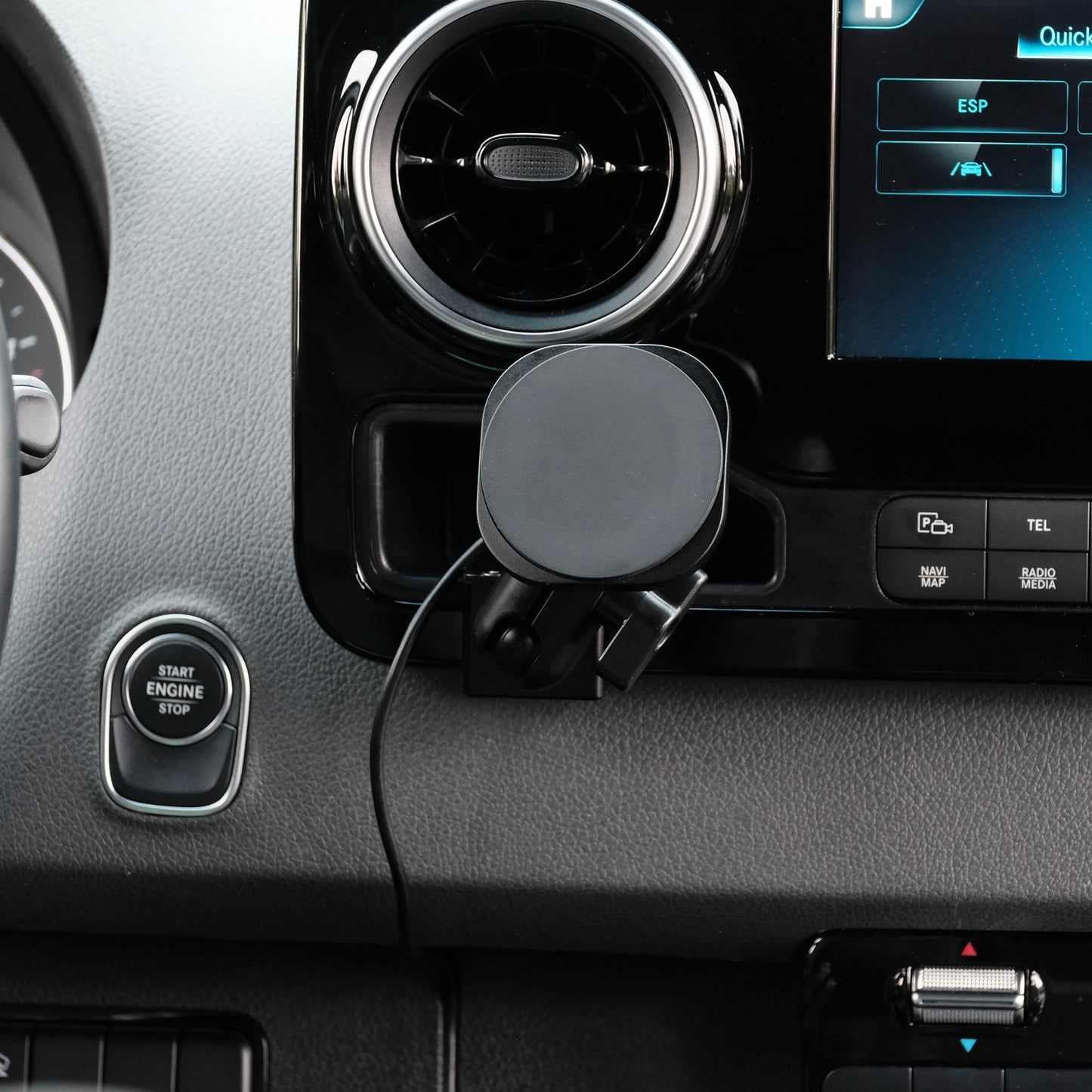 Image of Offroam MagSafe-compatible Phone Mount installed securely in Mercedes-Benz Sprinter 2019-2026. This premium phone mount installs easily without drilling or glue. High force magnets hold phone on any trail, road, or track. Perfect placement without blocking screens, driver view, or air flow. Fully adjustable positioning.