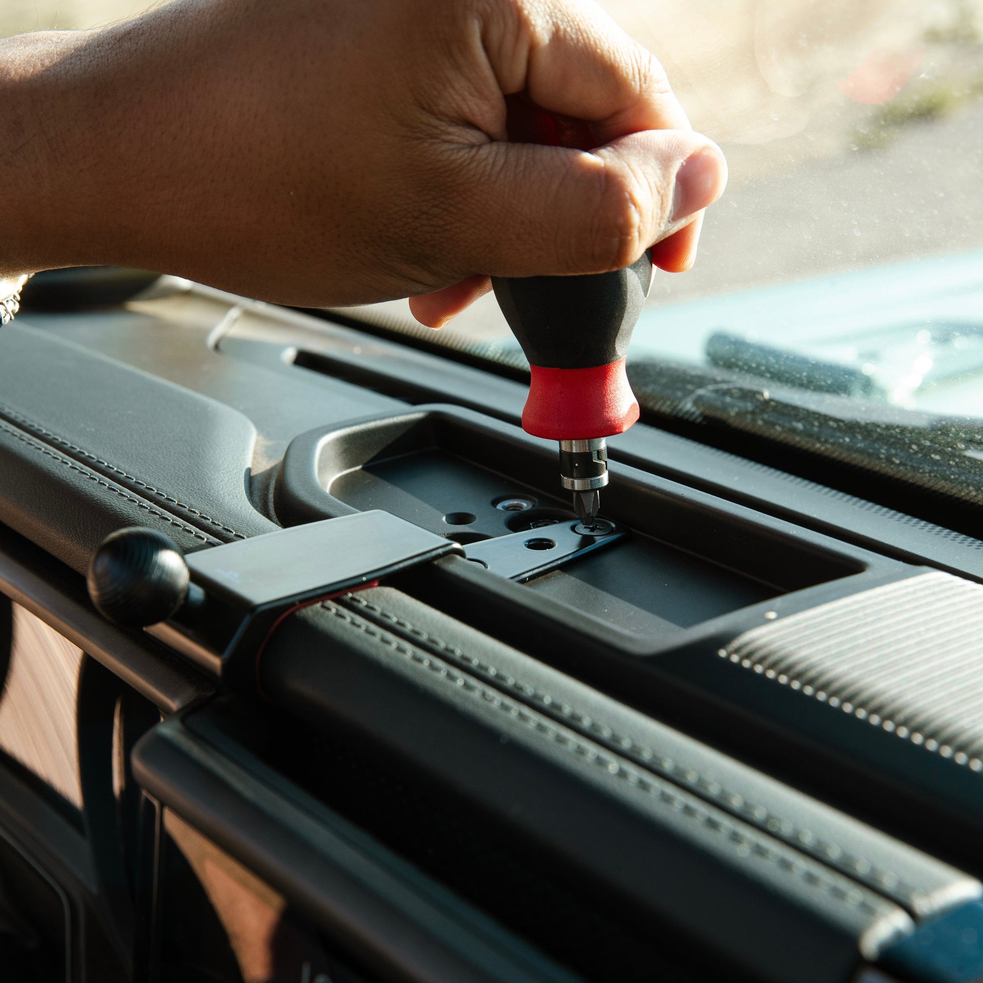 Secure all-metal off-road mounting base - a premium Jeep accessory —installed in a 2024-2025 Jeep Wrangler or Jeep Gladiator