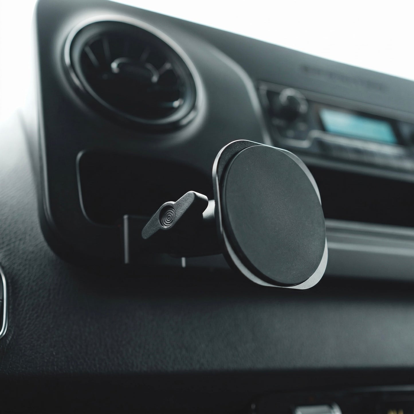 Image of Offroam MagSafe-compatible Phone Mount installed securely in Mercedes-Benz Sprinter 2019-2026. This premium phone mount installs easily without drilling or glue. High force magnets hold phone on any trail, road, or track. Perfect placement without blocking screens, driver view, or air flow. Fully adjustable positioning.