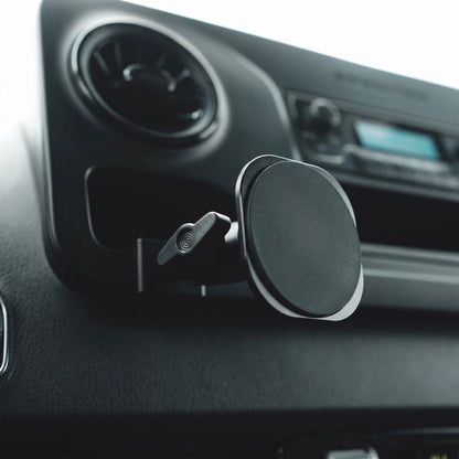 Image of Offroam MagSafe-compatible Phone Mount installed securely in Mercedes-Benz Sprinter 2019-2026. This premium phone mount installs easily without drilling or glue. High force magnets hold phone on any trail, road, or track. Perfect placement without blocking screens, driver view, or air flow. Fully adjustable positioning.