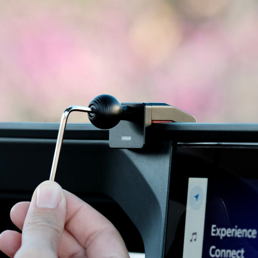 Image of Offroam Mounting Base installed securely in Toyota Land Cruiser Prado 250 2024-2025. This premium all metal phone mounting base installs easily without drilling or glue. Perfect placement without blocking screens, driver view, or air flow.