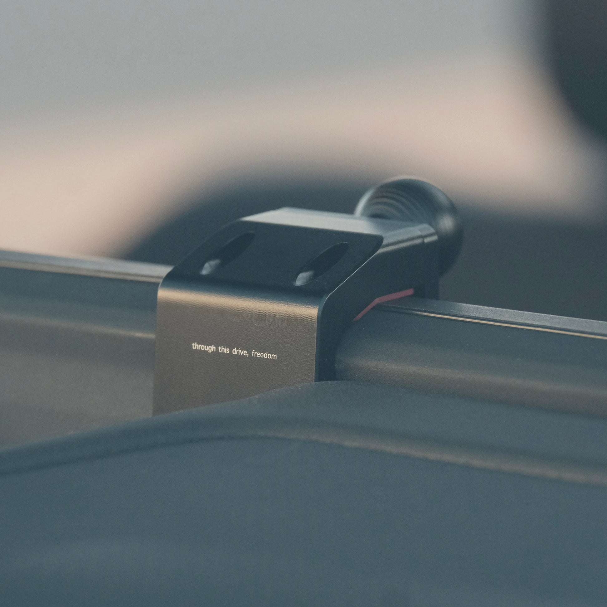 Image of Offroam Mounting Base installed securely in Toyota Land Cruiser Prado 250 2024-2025. This premium all metal phone mounting base installs easily without drilling or glue. Perfect placement without blocking screens, driver view, or air flow.
