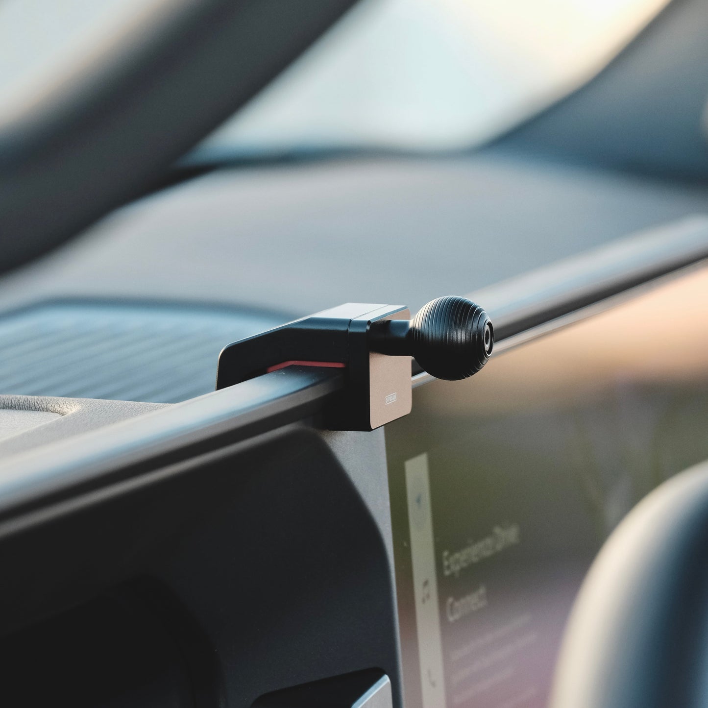 Image of Offroam Mounting Base installed securely in Toyota Land Cruiser Prado 250 2024-2025. This premium all metal phone mounting base installs easily without drilling or glue. Perfect placement without blocking screens, driver view, or air flow.