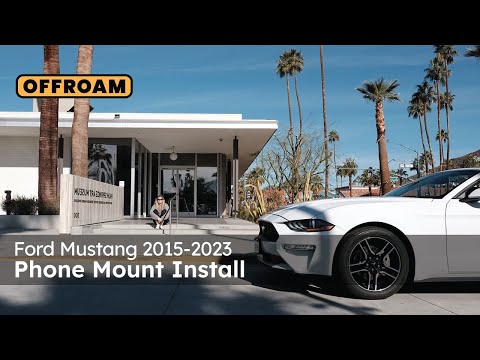 Image of Offroam Phone Mount installation for Ford Mustang 2015-2023. This premium phone mount installs easily without drilling or glue. Spring loaded Universal holder for use with any phone. Perfect placement without blocking screens, driver view, or air flow. Fully adjustable positioning.